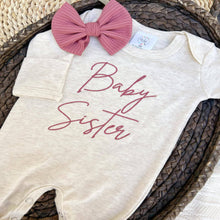 Load image into Gallery viewer, Long sleeve baby romper with pink embroidery that says "baby sister."