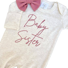 Load image into Gallery viewer, Long sleeve baby romper with pink embroidery that says "baby sister."