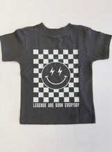 Load image into Gallery viewer, Gray short sleeve tee shirt. Smiley face and checked graphic on back with text "Legends are born everyday"
