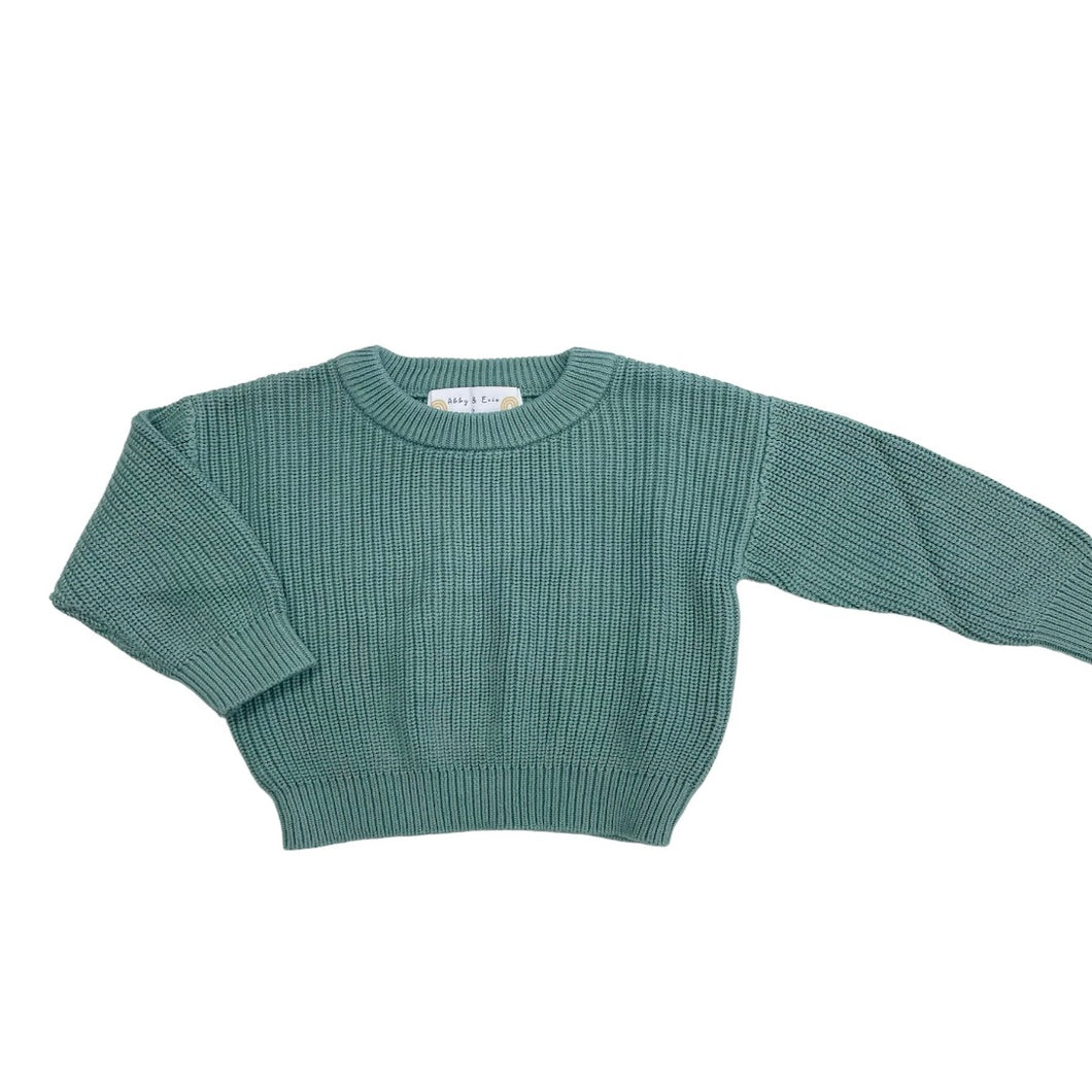 Green knit unisex sweater for baby, toddlers and kids. 