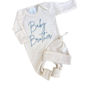 Long sleeve baby romper with blue embroidery that says "baby brother."