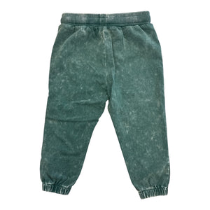 Distressed green jogger pants by Olive and Scout.