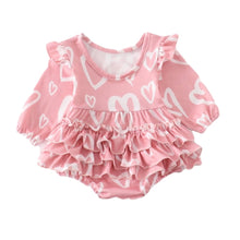 Load image into Gallery viewer, Pink baby girl romper with heart detail and ruffles on butt.