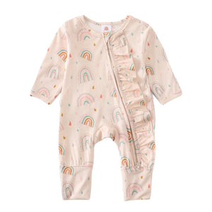 Neutral baby girl romper with 2-way zipper, feet and hand cover.  Adorned with rainbows and ruffles.