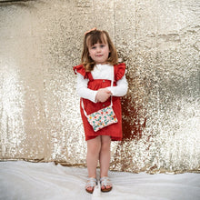 Load image into Gallery viewer, Rust colored girls&#39; suspender skirt with buttons and adjustable straps.