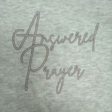 Load image into Gallery viewer, Heathered oat baby romper with Answered Prayer graphic, fold-over hands and feet, and snap closure