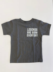 Gray short sleeve tee shirt. Says "Legends are born everyday"