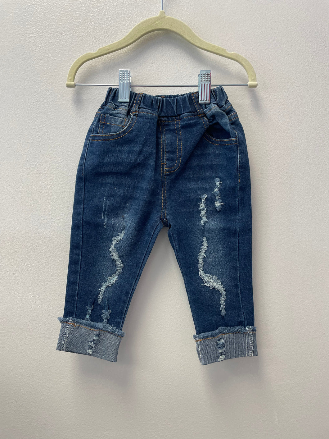 Baby jeans with trendy distressed style. Elastic waistband for added comfort.