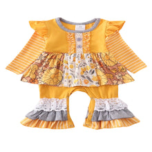 Load image into Gallery viewer, This yellow baby romper is burting with a vibrant yellow color and floral details. Long sleeves and flared legs make this a great option for any baby.