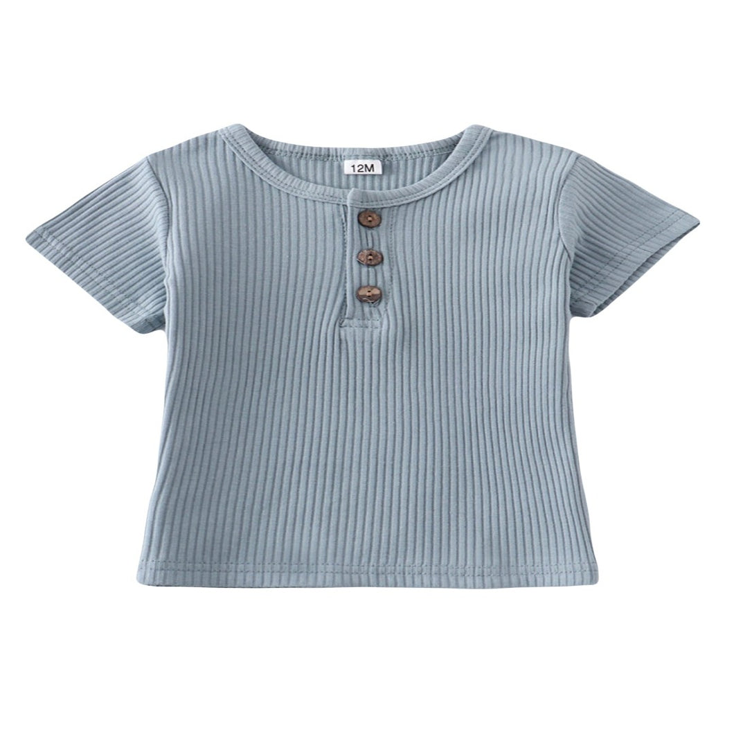 Light blue, ribbed shirt with button detail.
