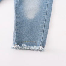 Load image into Gallery viewer, Distressed hem blue jeans.