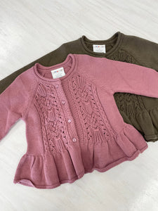 High end knit toddler cardigans with flared hem details and functioning buttons.