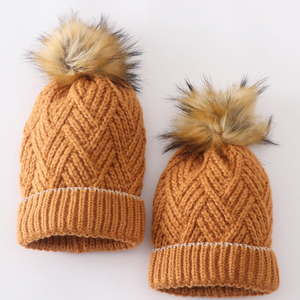 Rust colored matching mom/child winter hats.