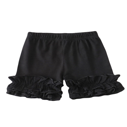 Black cotton girls shorts with ruffled hem.