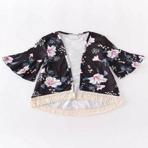 Girls' kimono with floral print and fringed hem.