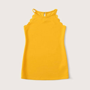 Vibrant yellow girls dress. Featuring tank top racer back and scalloped design.