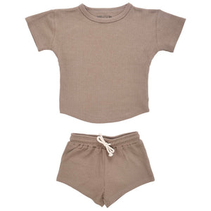 Organic gender neutral 2-piece short and shirt set for kids. Tan color, ribbed organic material.