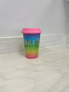 Cermaic colorful to-go cup. Comes with lid and cute saying "Unicorn Juice."