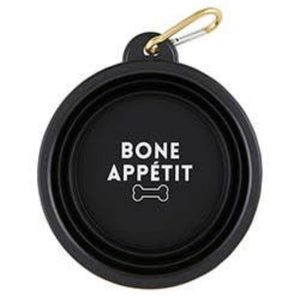 Black collapsible pet bowl with the saying "Bone appetit."